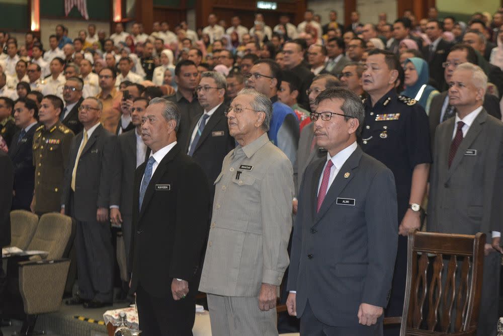 Tun Dr Mahathir Mohamad (centre) attends the launch of the Security and Public Order Policy at the Home Ministry in Putrajaya October 3, 2019. — Picture by Shafwan Zaidon