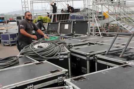 Workers set up a platform for the upcoming concert "Venezuela Aid Live" at Tienditas cross-border bridge between Colombia and Venezuela in Cucuta, Colombia February 20, 2019. REUTERS/Luisa Gonzalez