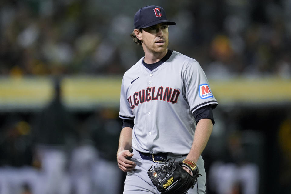 Cleveland Guardians’ Shane Bieber walks to the dugout after pitching against the Oakland Athletics during the sixth inning of a baseball game Thursday, March 28, 2024, in Oakland, Calif. (AP Photo/Godofredo A. Vásquez)