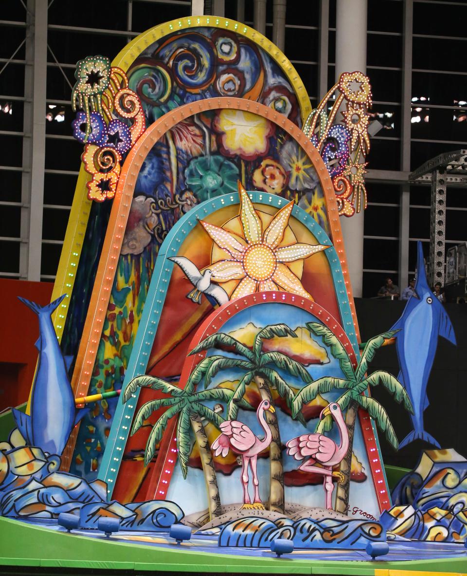 FILE - This is an Aug. 12, 2017, file photo showing the Miami Marlins' home run sculpture during the fourth inning of a baseball game between the Marlins and the Colorado Rockies, in Miami. The Miami Marlins’ home run sculpture is outta here. The team won county permission Tuesday, Oct. 16, 2018 to move the kitschy, widely disliked sculpture out of Marlins Park to the plaza outside the ballpark. The vote was a victory for Marlins CEO Derek Jeter, who can now remove from the ballpark one reminder of unpopular previous owner Jeffrey Loria’s regime.. (AP Photo/Wilfredo Lee, File)