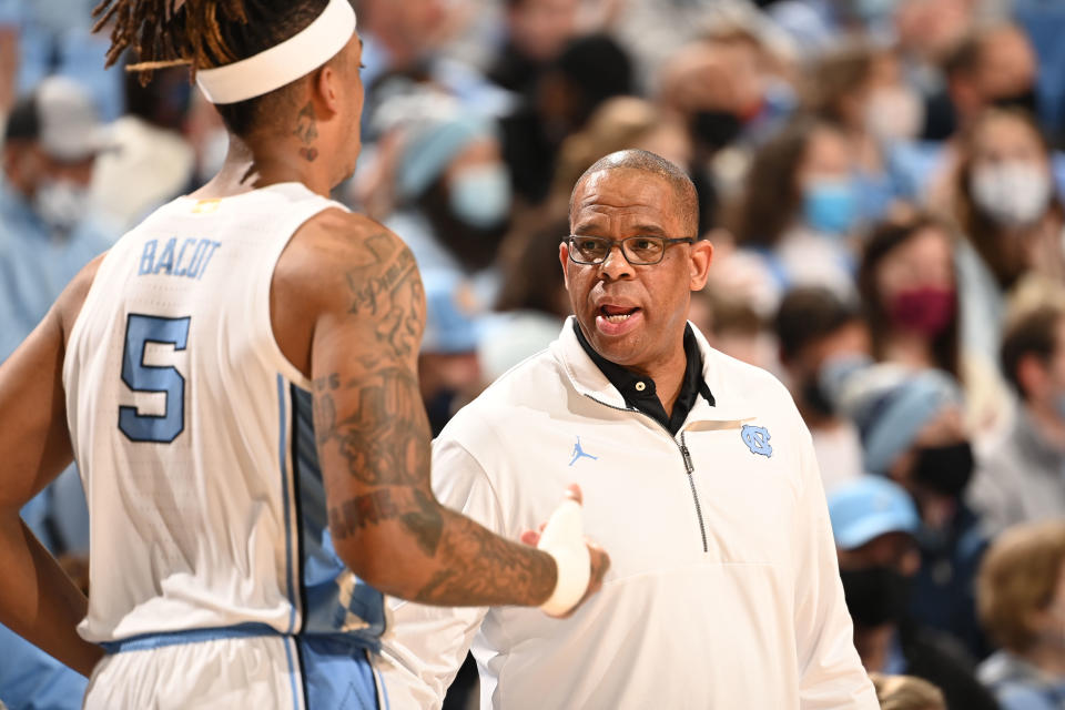 Jan 26, 2022; Chapel Hill, North Carolina, USA;  North Carolina Tar Heels head coach Hubert Davis with forward Armando Bacot (5) in the first half at Dean E. Smith Center. Mandatory Credit: Bob Donnan-USA TODAY Sports