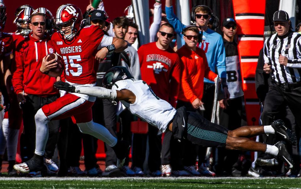 Indiana's Brendan Sorsby (15) runs during the first half of the Indiana versus Michigan State football game at Memorial Stadium on Saturday, Nov. 18, 2023.