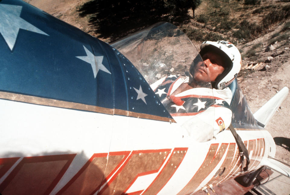 FILE - In this Sept. 8, 1974, file photo, Evel Knievel sits in the steam powered rocket motorcycle that will hopefully take him across Snake River Canyon in Twin Falls, Idaho. A judge has dismissed a trademark infringement lawsuit filed by Evel Knievel’s son against the Walt Disney Co. and movie company Pixar over a “Toy Story 4” daredevil character named Duke Caboom. Kelly Knievel said Monday, Sept. 27, 2021, he's disappointed and may take the case to the 9th Circuit Court of Appeals in San Francisco. (AP Photo, File)