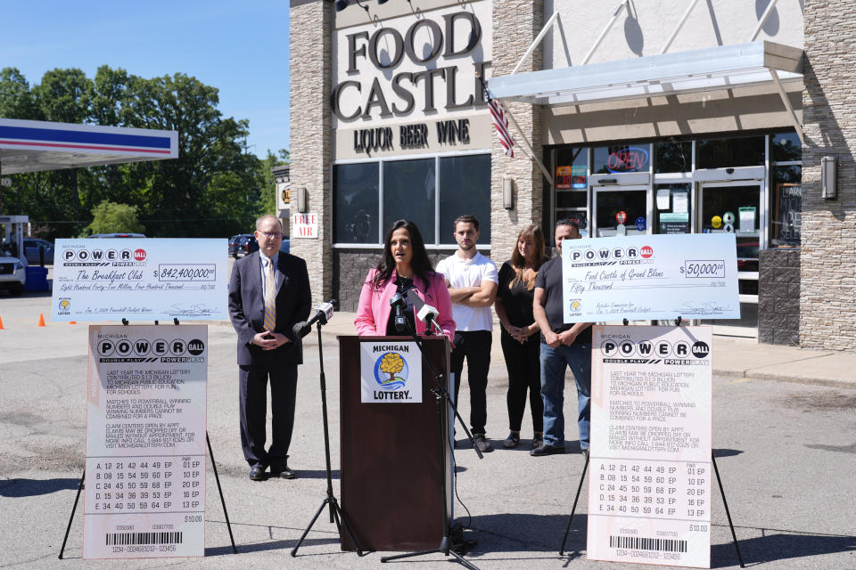 Michigan Lottery Commissioner Suzanna Shkreli announces The Breakfast Club as the winner of the $842.4 million Powerball jackpot, from the Jan. 1, 2024 drawing, at a news conference at Food Castle in Grand Blanc Township, Mich., Tuesday, June 11, 2024. (AP Photo/Paul Sancya)