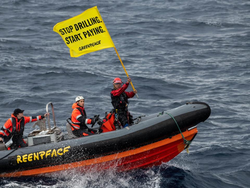 Greenpeace climate justice activists approaching Shell platform.