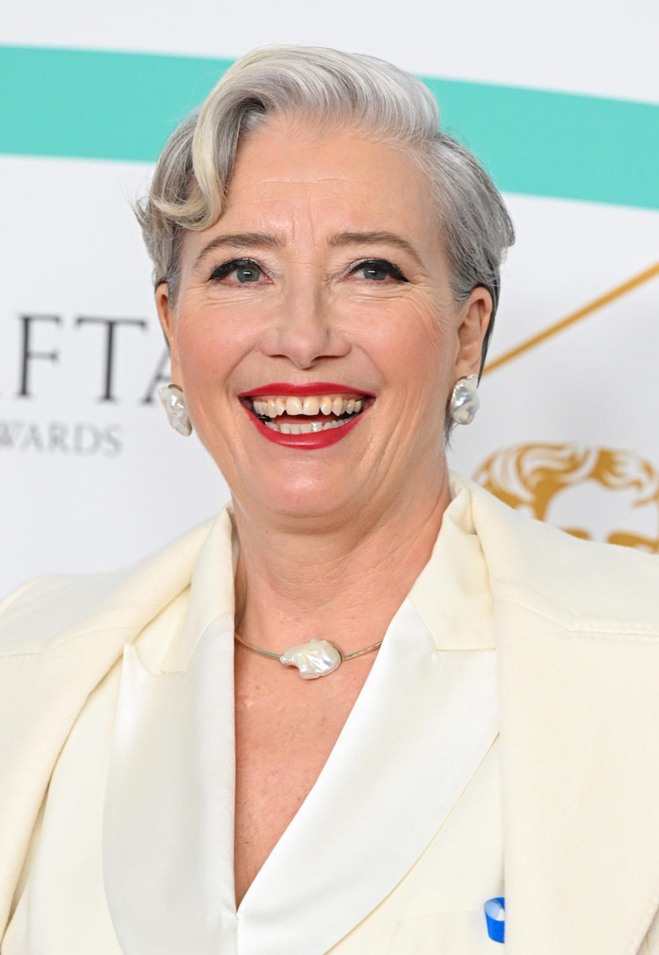 <p> The quiff was a super popular hairstyle for men in the 1950s, but it also became a feature of both long and short hairstyles for women. It looks great on hair of any length, as actress Emma Thompson proves with this curled quiff on her cropped style. </p>