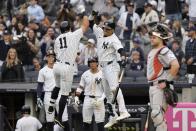 New York Yankees' Anthony Volpe, left, celebrates with Juan Soto after hitting a two-run home run during the third inning of a baseball game against the Houston Astros, Thursday, May 9, 2024, in New York. (AP Photo/Frank Franklin II)
