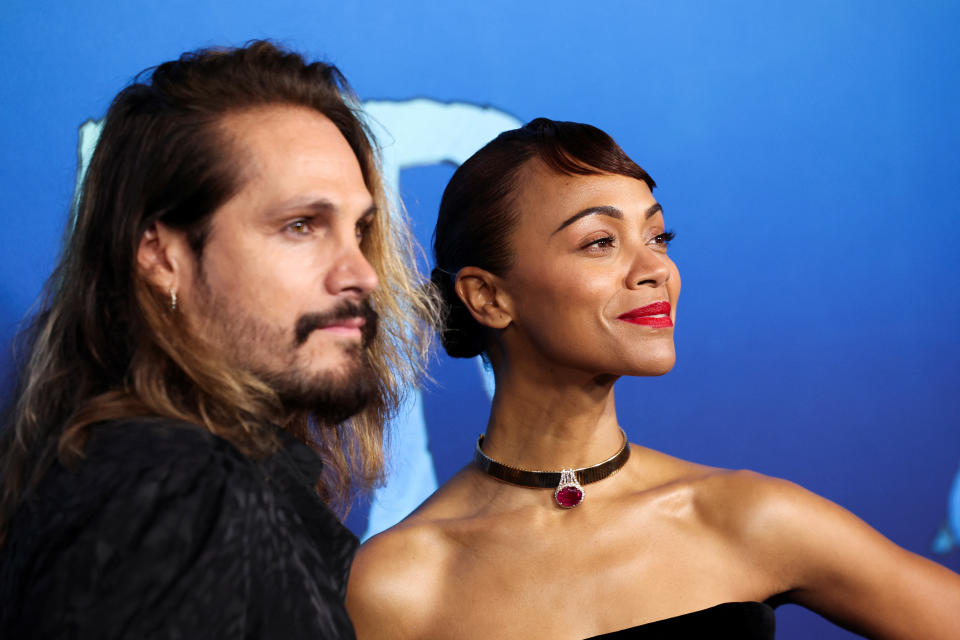Zoe Saldana and her husband Marco Perego Saldana attend a premiere for the film Avatar: The Way of Water, at Dolby theatre in Los Angeles, California, U.S., December 12, 2022.  REUTERS/Mario Anzuoni