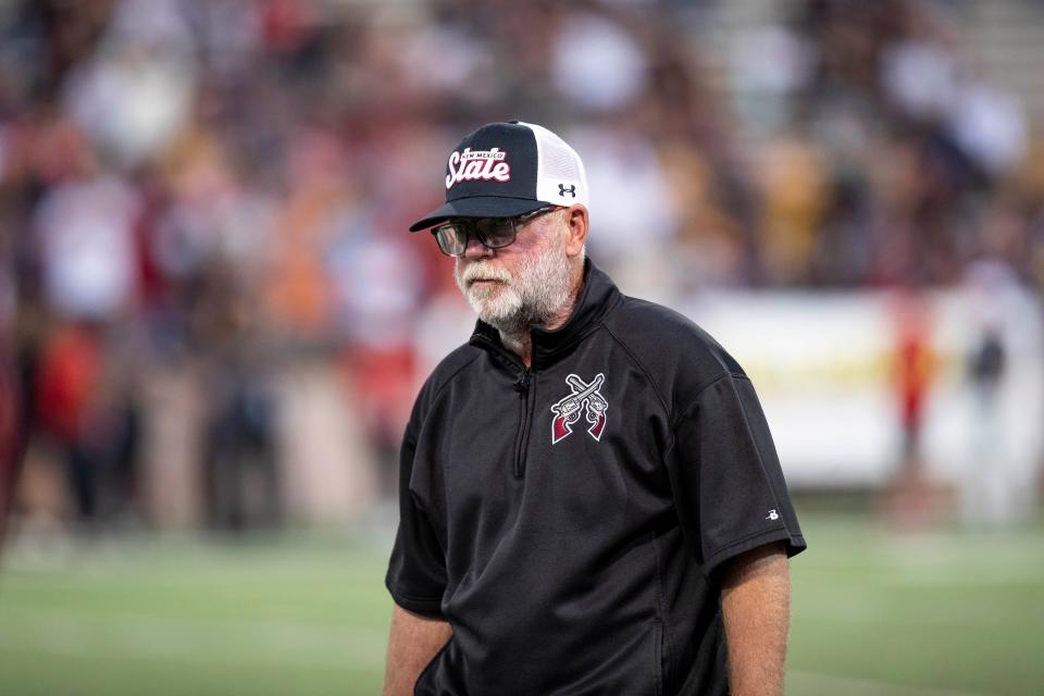 Head coach Jerry Kills walks down the sideline during the NMSU v. UNM football game on Saturday, Oct. 15, 2022, at Aggies Memorial Stadium.