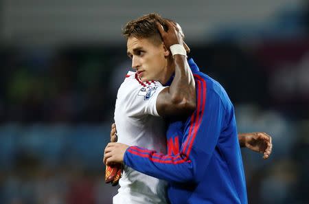 Aston Villa v Manchester United - Barclays Premier League - Villa Park - 14/8/15. Manchester United's Adnan Januzaj and Ashley Young celebrate at the end of the match. Action Images via Reuters / Andrew Couldridge