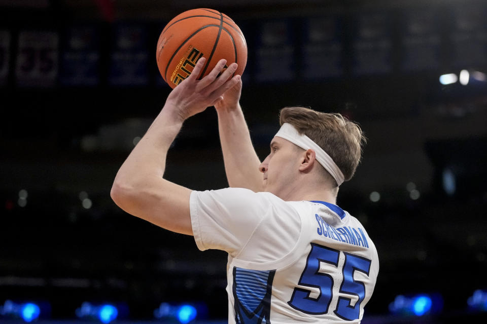 Creighton's Baylor Scheierman (55) shoots for three points in the first half of an NCAA college basketball game against Villanova during the quarterfinals of the Big East conference tournament, Thursday, March 9, 2023, in New York. (AP Photo/John Minchillo)