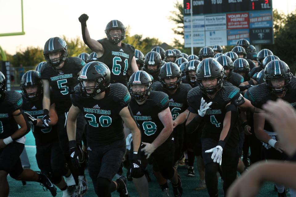 North Oldham comes out onto the field before the game against South Oldham on Friday, Sept. 8, 2023.