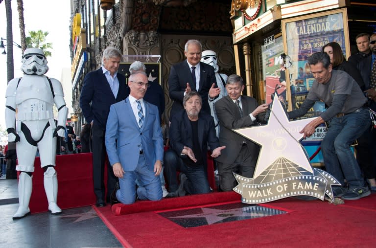 Harrison Ford (top L), George Lucas (top C), Mark Hamill (bottom C), and Hollywood Chamber of Commerce, President/CEO Leron Gubler (bottom R), and guests attend as Mark Hamill is honored with a star on the Hollywood Walk of Fame on March 8, 2018