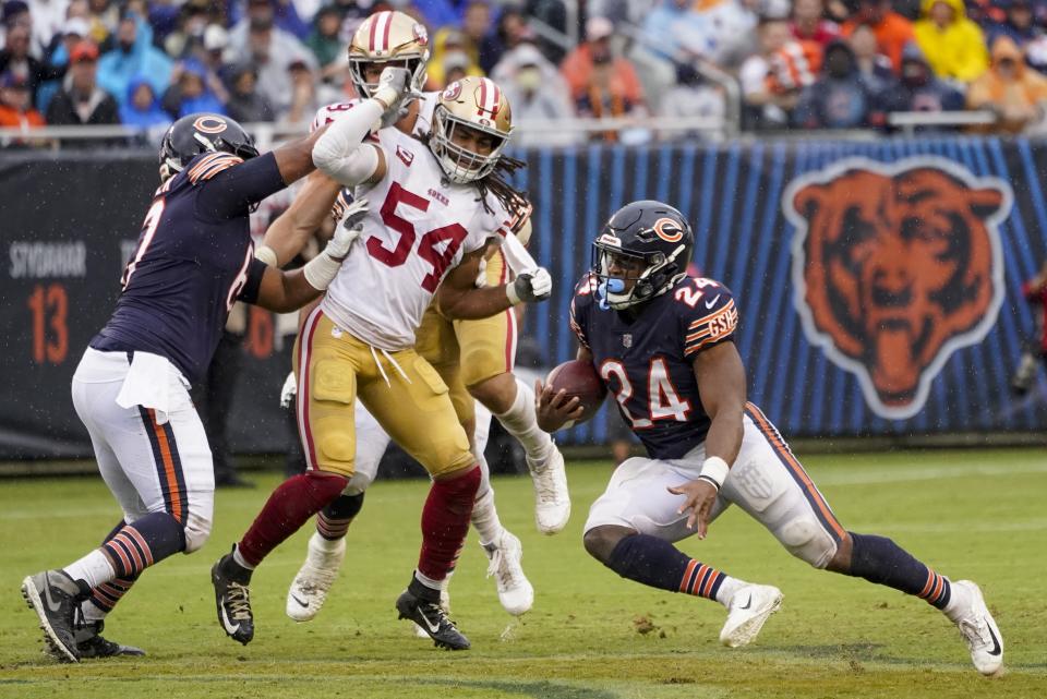 Chicago Bears' Khalil Herbert runs during the first half of an NFL football game against the San Francisco 49ers Sunday, Sept. 11, 2022, in Chicago. (AP Photo/Charles Rex Arbogast)