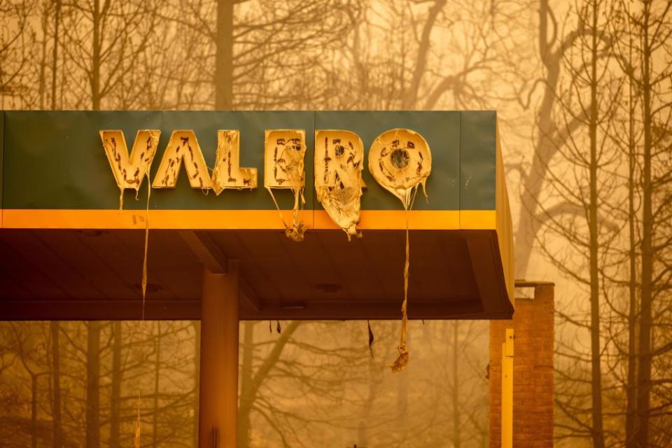 A burned Valero gas station smolders during the Creek fire in an unincorporated area of Fresno County, California on September 08, 2020AFP via Getty Images