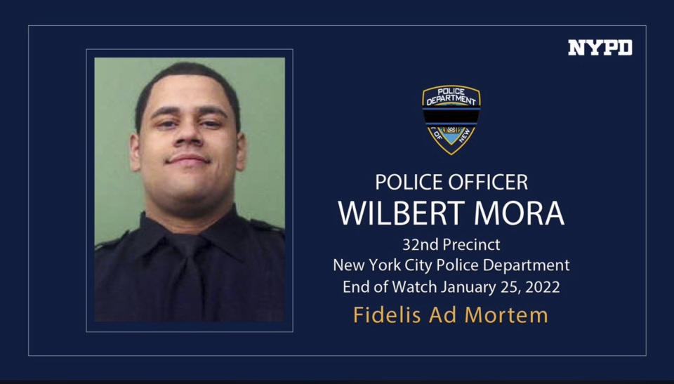 In an undated photo provided by the New York City Police Department, NYPD Officer Wilbert Mora, who was involved in a police shooting, Jan. 21, 2022, in New York City, is shown. Officer Mora, gravely wounded in a Harlem shooting that took his partner's life last week, has also died of his injuries, police Commissioner Keechant Sewell said Tuesday, Jan. 25, 2022. (Courtesy of NYPD via AP)