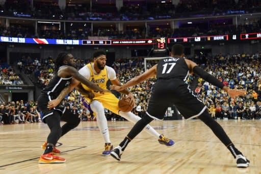 Under a heavy police presence, the NBA game in Shanghai got under way smoothly