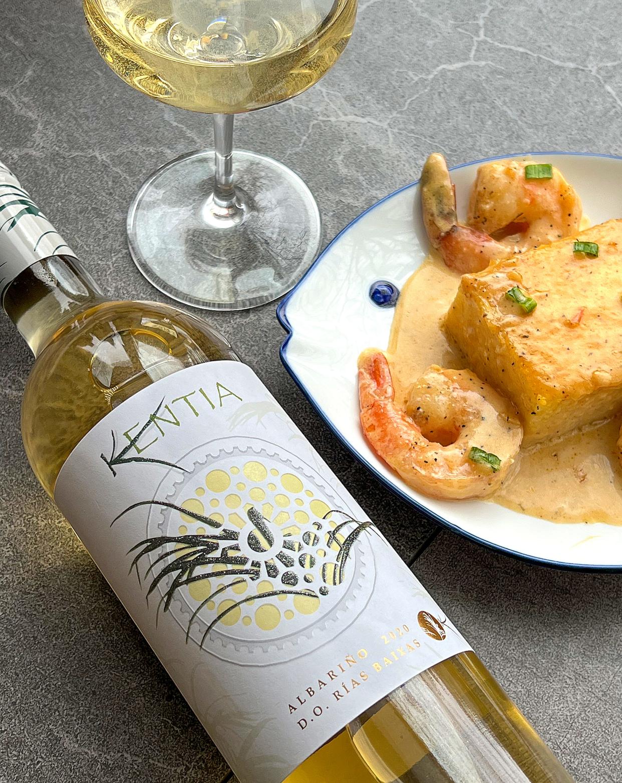 A bottle of Kentia's 2021 Albariño pairs perfectly with an order of shrimp and grits from the Valley Cafe in Akron.