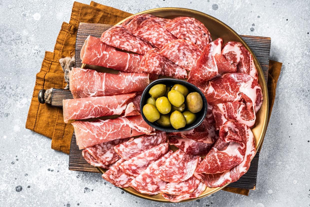 Cured meat platter of traditional Italian appetizers with Prosciutto crudo, Salami and Coppa Sausage.