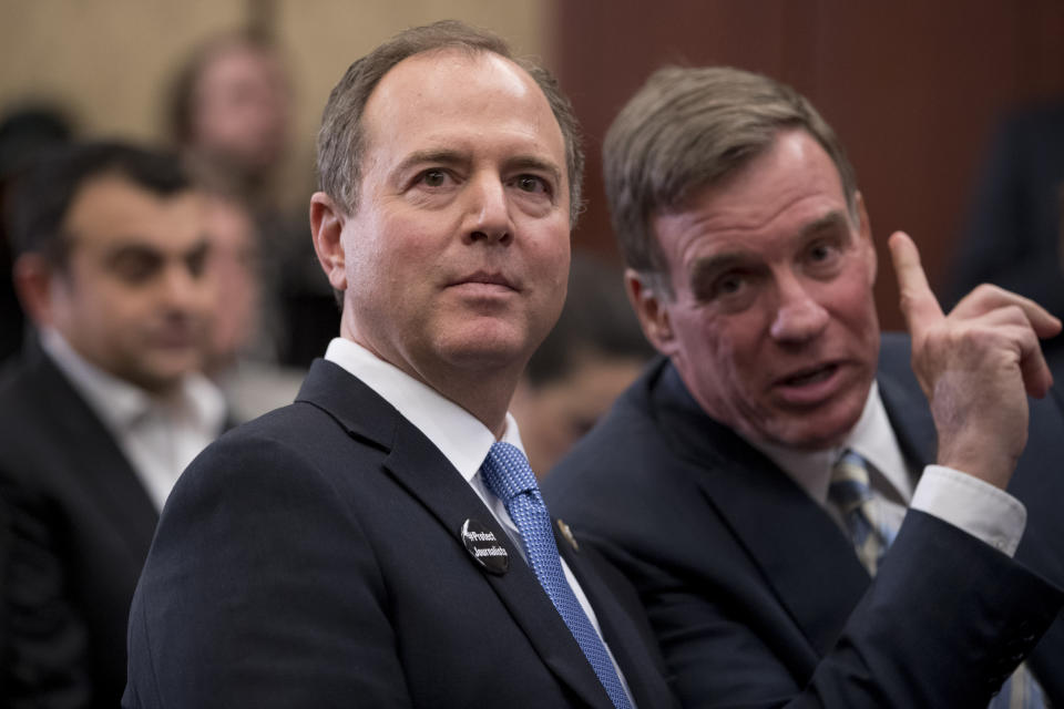 Adam Schiff, D-Calif., chairman of the House Intelligence Committee, left, speaks with Sen. Mark Warner, D-Va., at an event marking 100 days since the death of Jamal Khashoggi on Capitol Hill in Washington, Thursday, Jan. 10, 2019. (AP Photo/Andrew Harnik)