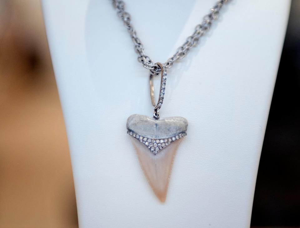 Designer Valentina Kova sells diamond and jewel encrusted shark teeth jewelry at her Worth Avenue store in Palm Beach. 