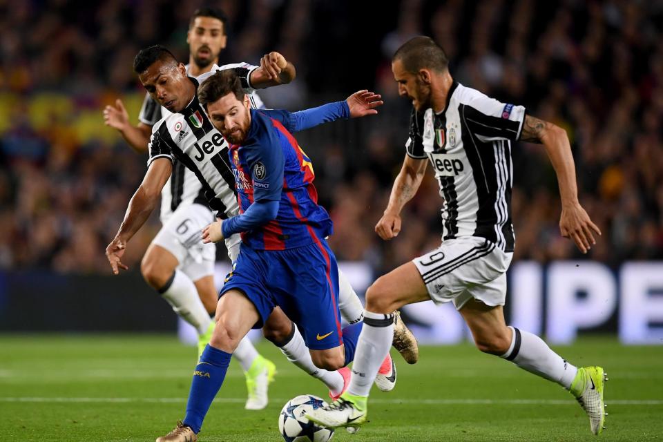 Sandro (L) and Bonucci (R) in action against Lionel Messi: Bongarts/Getty Images