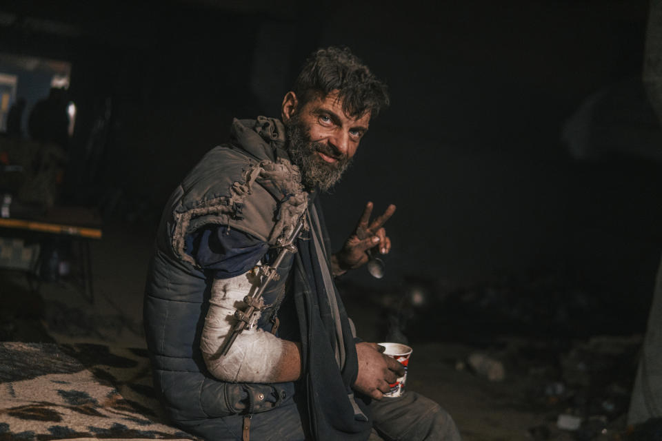 In this photo provided by Azov Special Forces Regiment of the Ukrainian National Guard Press Office, a Ukrainian soldier injured during fighting against Russian forces, poses for a photographer inside the Azovstal steel plant in Mariupol Ukraine, May 10, 2022. For nearly three months, Azovstal’s garrison clung on, refusing to be winkled out from the tunnels and bunkers under the ruins of the labyrinthine mill. A Ukrainian soldier-photographer documented the events and sent them to the world. Now he is a prisoner of the Russians. His photos are his legacy.(Dmytro Kozatski/Azov Special Forces Regiment of the Ukrainian National Guard Press Office via AP)