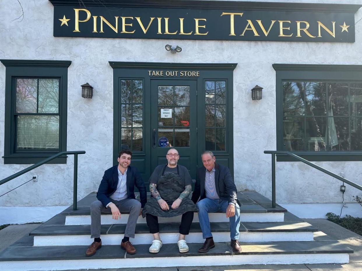 Angelo Pizza, left, the owner of The Angelo Pizza in Philadelphia, is partnering with Andrew Abruzzese, owner of the Pineville Tavern, to make and sell his pies out of the Pineville's takeout store in Wrightstown. The Pineville's Chef Matt Levin, center, is rolling out four specialty sandwiches to be offered at the store as well.