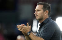 Everton's head coach Frank Lampard applauds prior the English Premier League soccer match between Leeds United and Everton, at Elland Road Stadium in Leeds, England, Tuesday, Aug. 30, 2022. (AP Photo/Jon Super)