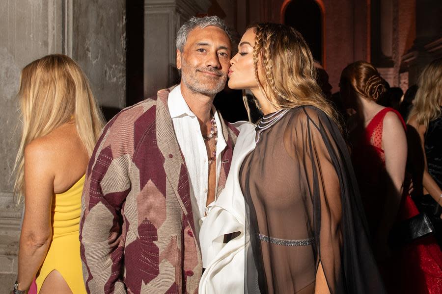 Happy couple Taika Waititi and Rita Ora share a moment at the amfAR Gala Venezia, held during the 2023 Venice International Film Festival. (Ryan Emberley for amfAR)