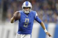 Sep 23, 2018; Detroit, MI, USA; Detroit Lions quarterback Matthew Stafford (9) runs the ball during the fourth quarter against the New England Patriots at Ford Field. Mandatory Credit: Raj Mehta-USA TODAY Sports