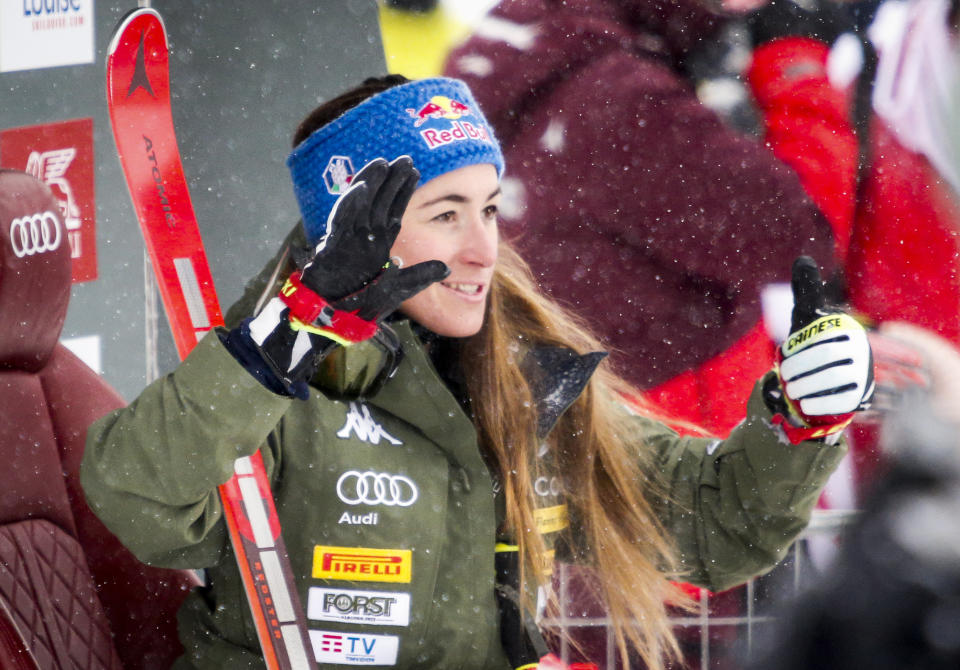 Italy's Sofia Goggia reacts in the finish area following her run in the the women's World Cup downhill ski race in Lake Louise, Alberta, on Saturday, Dec. 4, 2021. (Jeff McIntosh/The Canadian Press via AP)