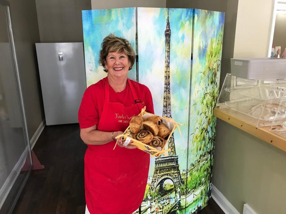 Trish Koodrich inside her Trish's Truffles and Sweet Treats storefront in Monaca. The soft opening is planned for Sept. 11.