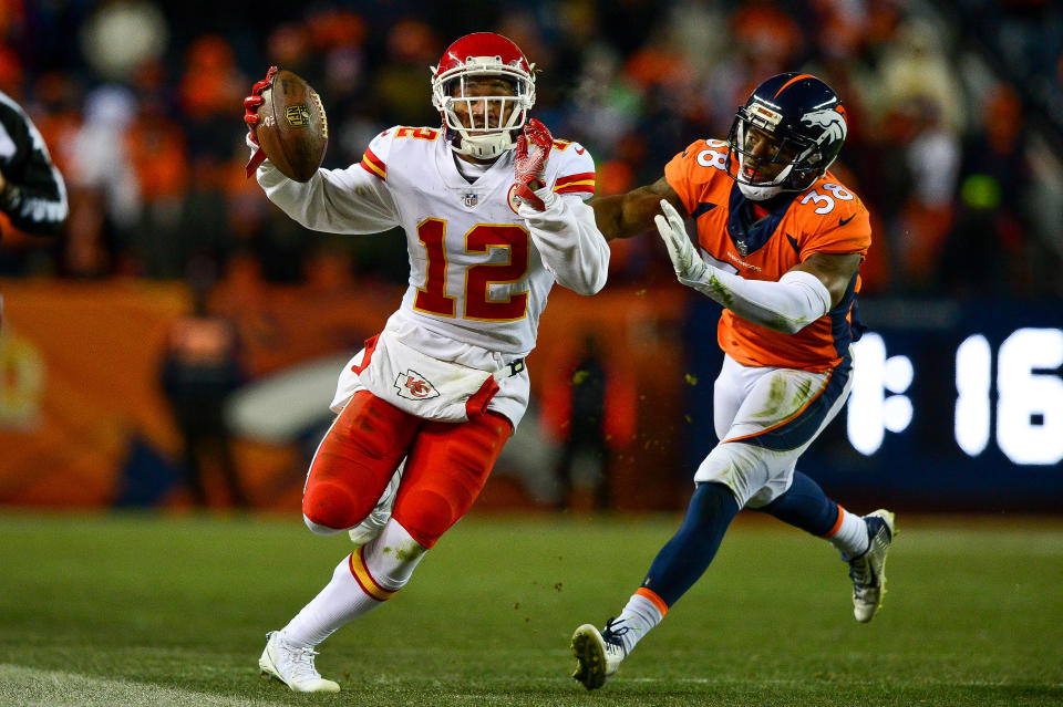 <p>Wide receiver Albert Wilson #12 of the Kansas City Chiefs is pushed out of bounds by cornerback Marcus Rios #38 of the Denver Broncos after a catch at Sports Authority Field at Mile High on December 31, 2017 in Denver, Colorado. (Photo by Dustin Bradford/Getty Images) </p>