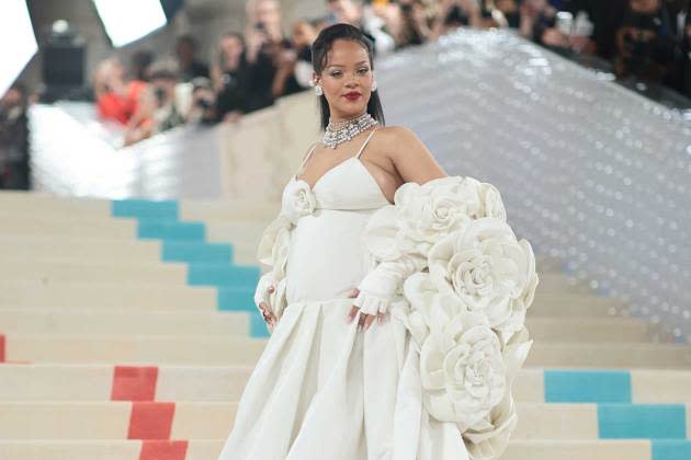 Rihanna Flexes Baby Bump at Pharrell's Louis Vuitton Debut Show