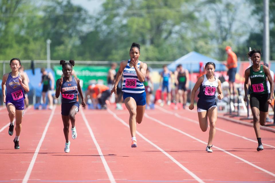 Spring Grove's Laila Campbell (center) sprints to a gold medal in the 100-meter dash (11.63) at the PIAA District 3 Track and Field Championships on Saturday, May 21, 2022, at Shippensburg University. 