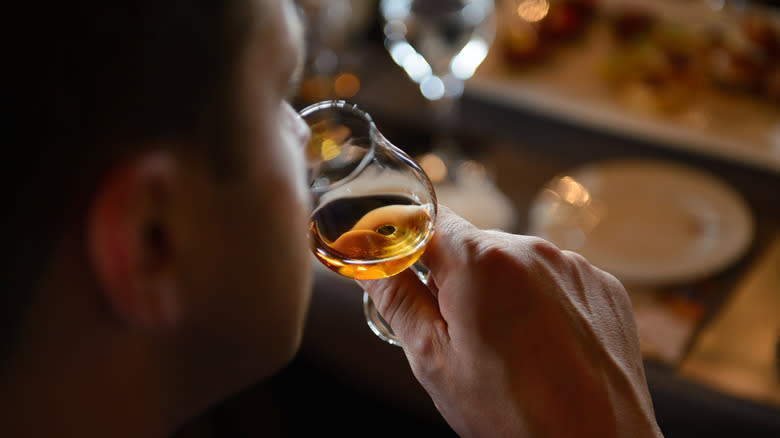 Tasting cognac in glass
