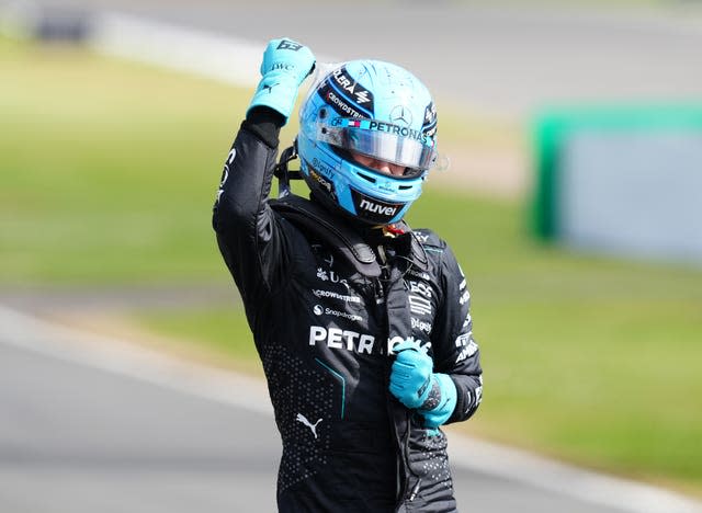 George Russell celebrates pole position at Silverstone