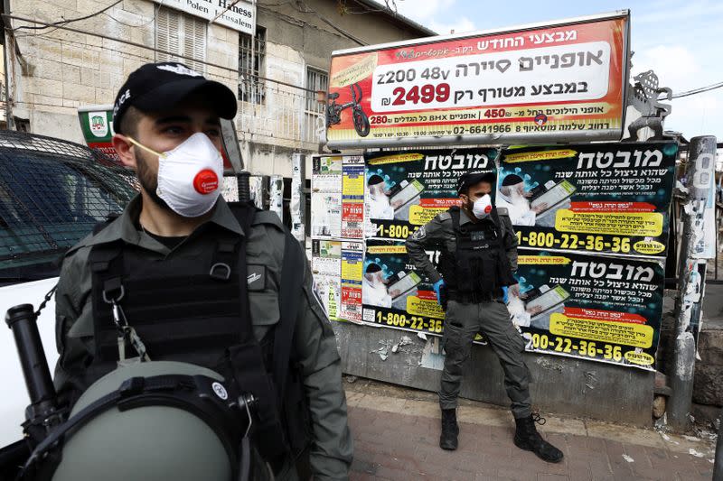 Israeli police wearing masks patrol as they enforce a national lockdown to fight the spread of the coronavirus disease (COVID-19) in Mea Shearim neighbourhood of Jerusalem