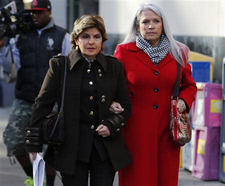 Irene McCormack Jackson and her attorney Gloria Allred (L) walk to attend the sentencing hearing for former San Diego Mayor Bob Filner in San Diego, California December 9, 2013. REUTERS/Mike Blake