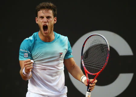 Tennis - ATP 500 - Rio Open - Semifinal - Rio de Janeiro, Brazil - February 24, 2018. Diego Schwartzman of Argentina celebrates during his match against Nicolas Jarry of Chile. REUTERS/Sergio Moraes