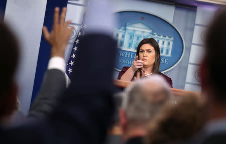 White House Press Secretary Sarah Huckabee Sanders answers questions from reporters about Judge Brett Kavanaugh's Supreme Court nomination during a news conference in the White House briefing room in Washington, U.S., October 3, 2018. REUTERS/Jonathan Ernst