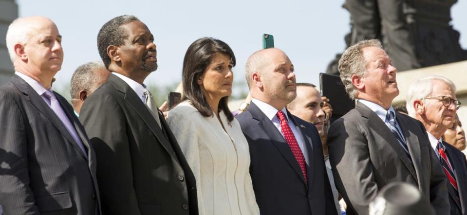 <div class="inline-image__caption"><p>South Carolina Governor Nikki Haley (C) watches as the Confederate battle flag is permanently removed from the South Carolina statehouse grounds during a ceremony in Columbia, South Carolina, July 10, 2015.</p></div> <div class="inline-image__credit">Jason Miczek/Reuteres</div>