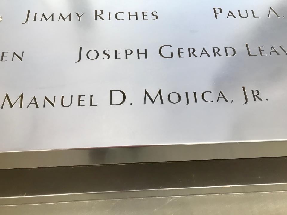 The name of NYC Firefighter and family friend Manny Mojica is etched in a bronze parapet framing the memorial pools at the 9/11 memorial.