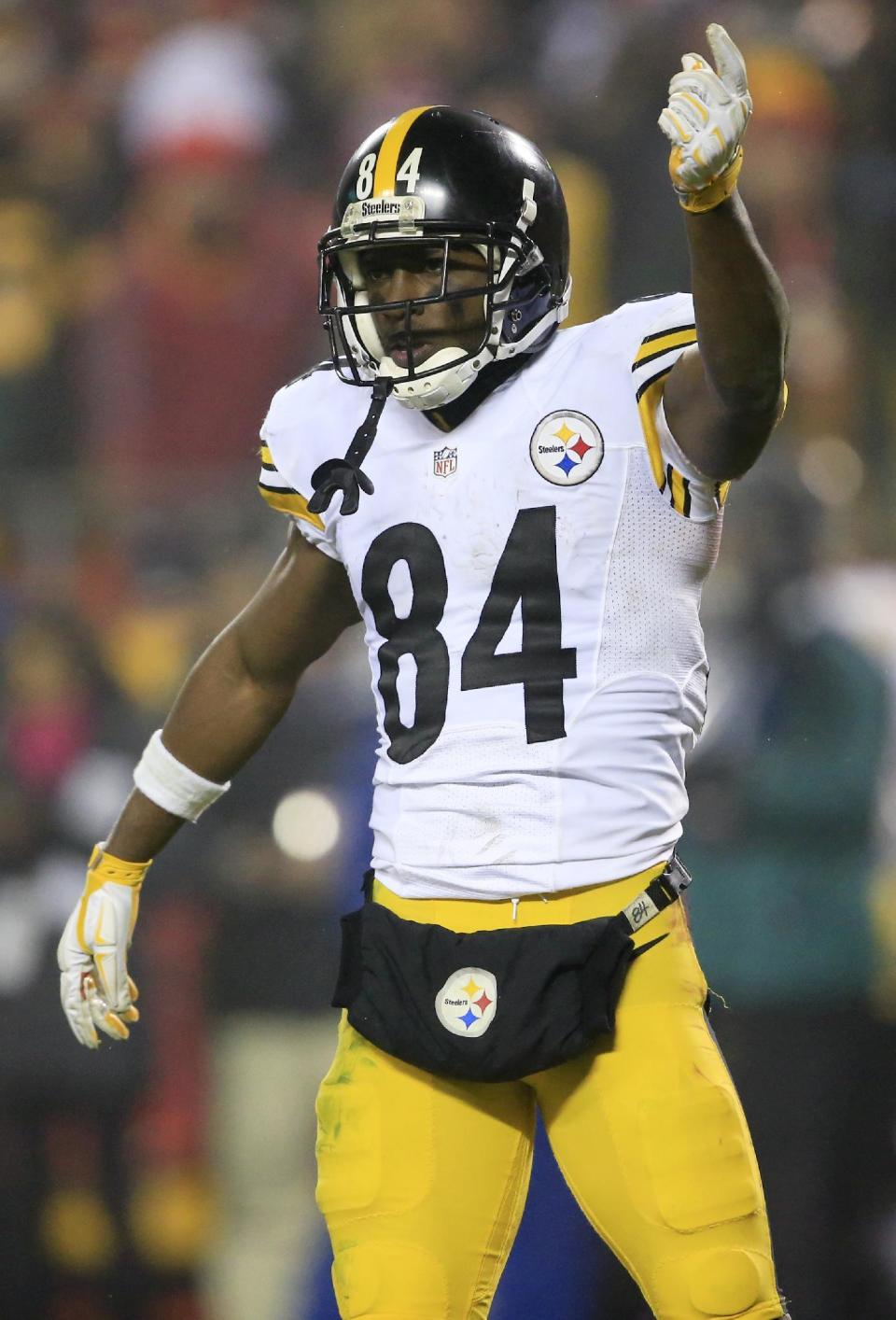 Pittsburgh Steelers wide receiver Antonio Brown celebrates at the end of an NFL divisional playoff football game against the Kansas City Chiefs on Sunday, Jan. 15, 2017, in Kansas City, Mo. The Steelers won 18-16. (AP Photo/Orlin Wagner)