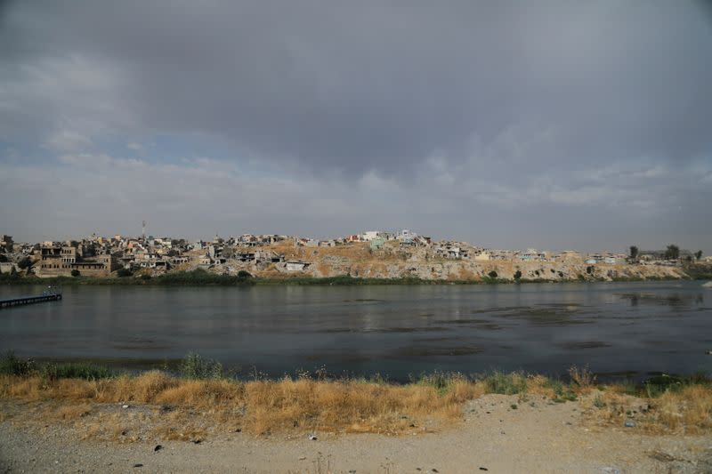 A view shows damaged and destroyed houses in the old city of Mosul on the Tigris River in Mosul