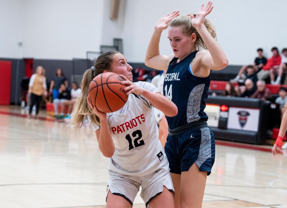 Germantown Academy's Isabella Casey (12) against Episcopal Academy's Brynn Kehl (14) during their girls’ basketball game in Fort Washington on Thursday, Jan. 11, 2024.

Daniella Heminghaus | Bucks County Courier Times