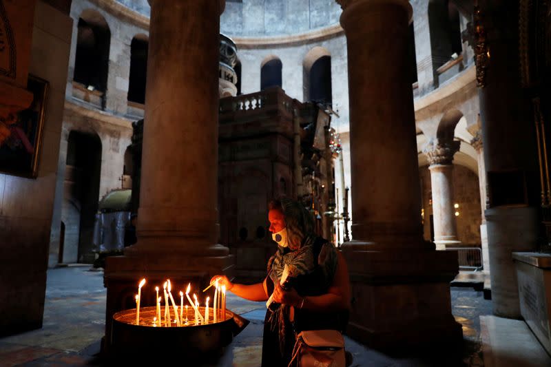 Church of the Holy Sepulchre reopens its doors following the easing of the novel coronavirus restrictions, in Jerusalem's Old City