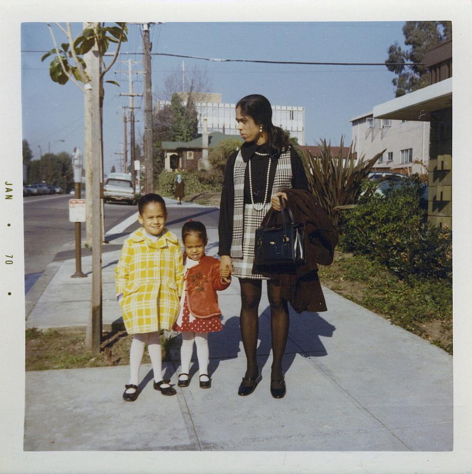This January 1970 photo provided by the Kamala Harris campaign shows her, left, with her sister, Maya, and mother, Shyamala, outside their apartment in Berkeley, Calif., after her parents' separation.