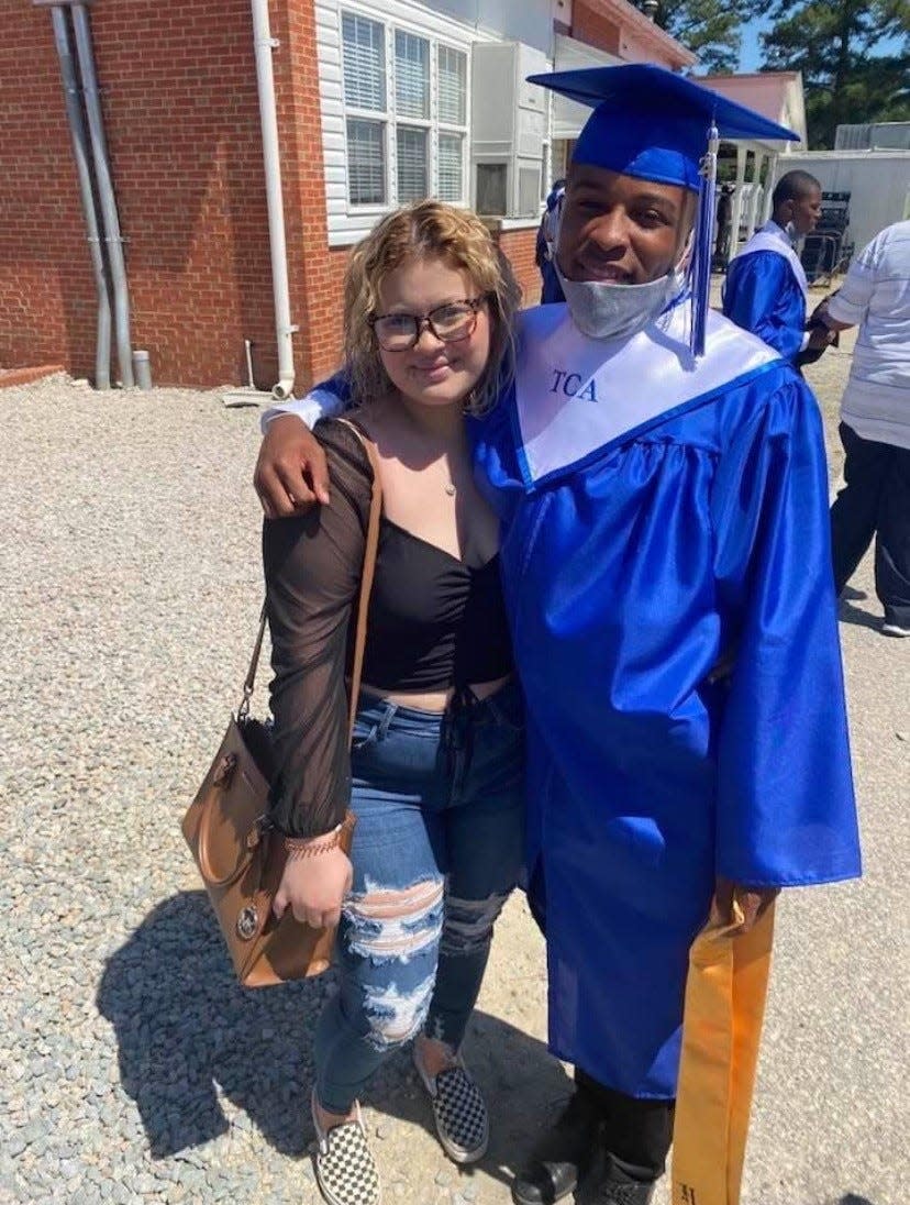 Konye Melvin with his girlfriend, Laycee Maynard, at his graduation from Tarheel Challenge Academy on May 22.